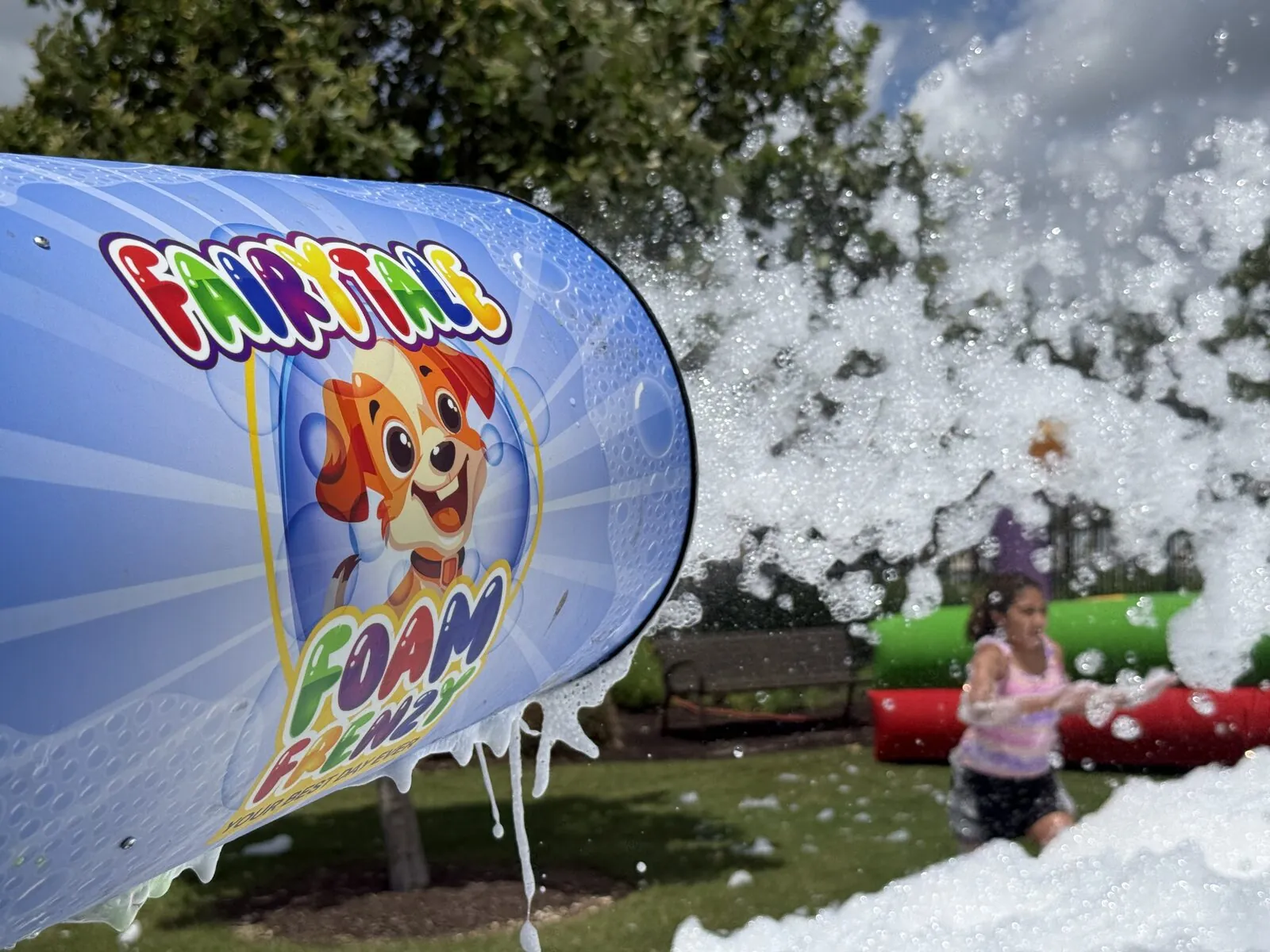 Fairytale Foam Frenzy foam cannon blasting foam as a child runs through it