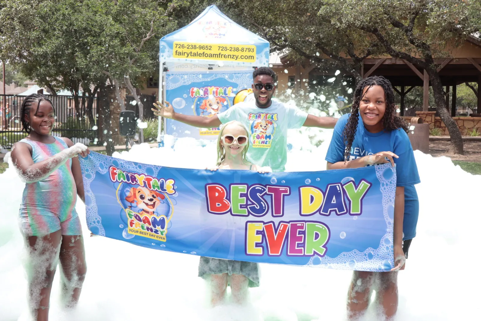A crowd celebrating in foam at a Fairytale Foam Frenzy event